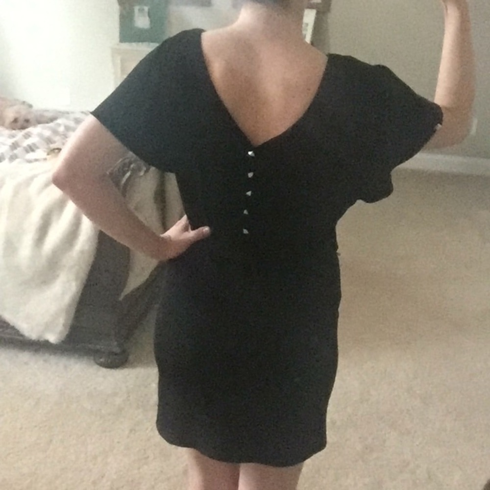 Black pullover dress with studded detail
